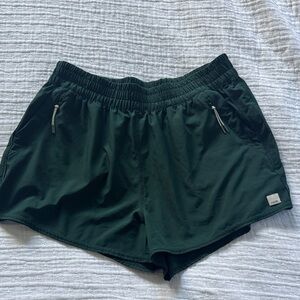 Forest green dash Vuori shorts. Size Lg